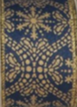 2.5" X 10 YARD GOLD SNOWFLAKE ON NAVY RIBBON
