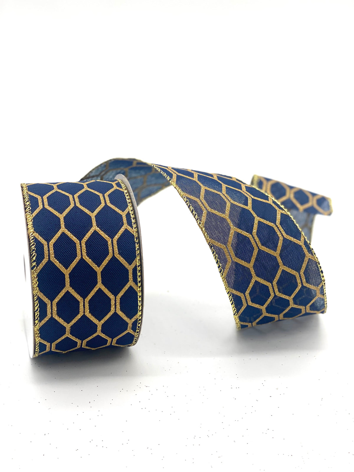 2.5" X 10 YARD GOLD GEOMETRIC ON NAVY RIBBON
